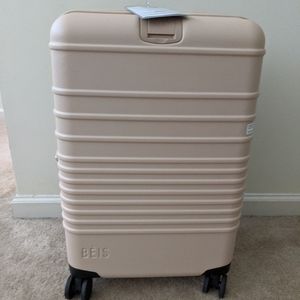 The Carry-On Roller in Beige (21 in.)
